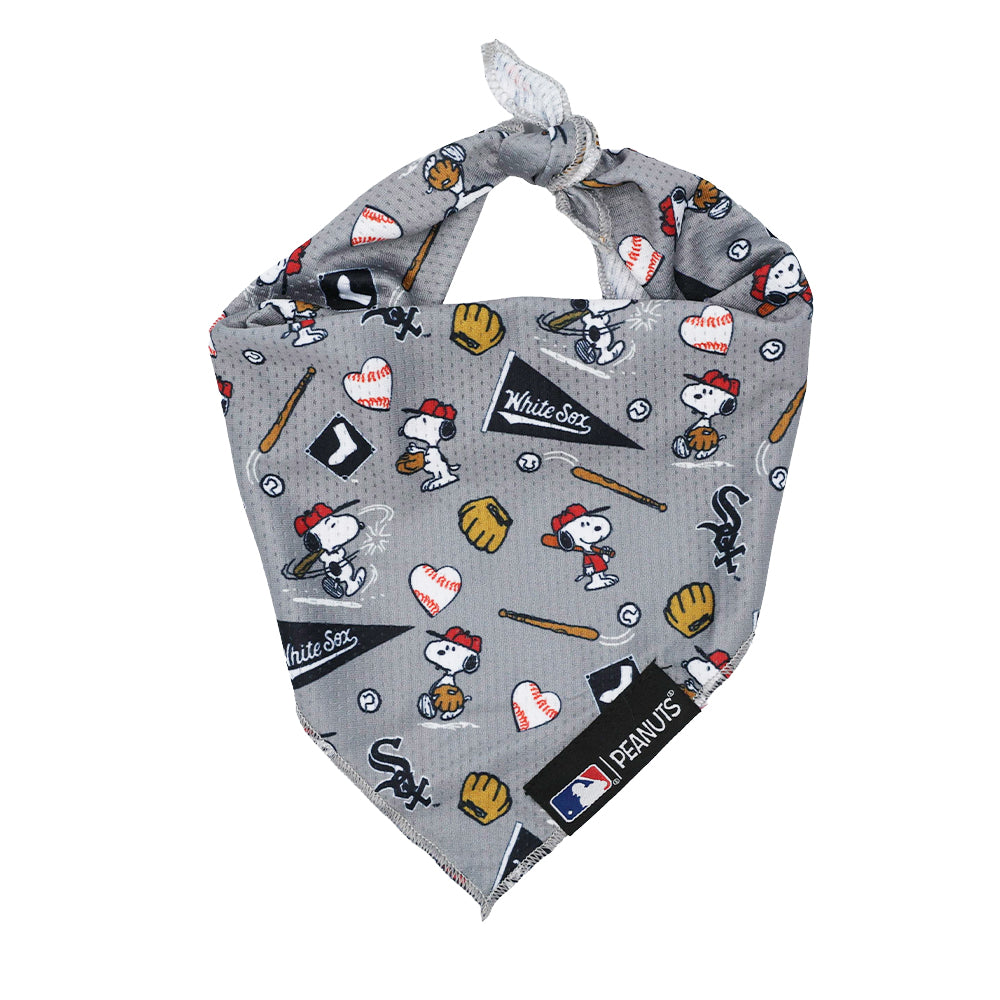 The Dog Bandana - MLB™ x Peanuts™ Chicago White Sox™ by Sassy Woof features Snoopy playing baseball and team logos on gray cooling mesh, plus official MLB and Peanuts branding tags.