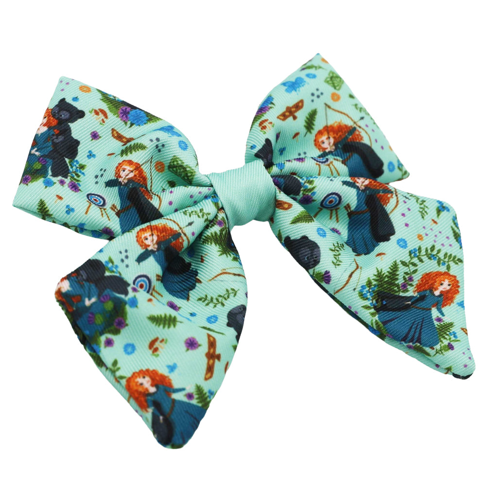 The Sassy Woof Dog Sailor Bow - Disney's Merida features a light blue design with Merida, archery targets, bears, and forest elements—perfect for fans of Brave or anyone seeking Merida-inspired dog accessories.