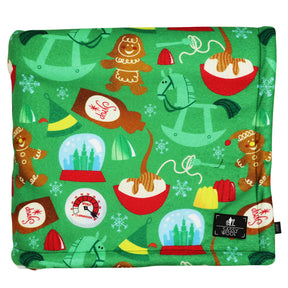 The Sassy Woof Pet Blanket - Elf™ is a green sherpa blanket featuring holiday-themed prints—perfect for keeping your pet cozy and festive all season, and making a great Christmas gift.