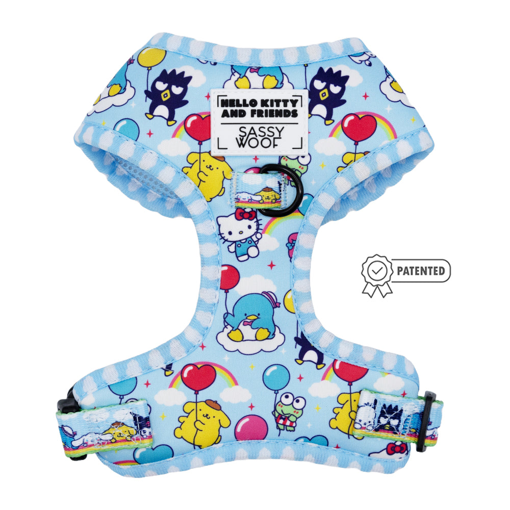 The Sassy Woof Dog Four Piece Bundle - Hello Kitty® & Friends In the Sky features a light blue harness with colorful balloons, clouds, a Sassy Woof label on the chest, and a patented symbol to the right—perfect for Sanrio fans.