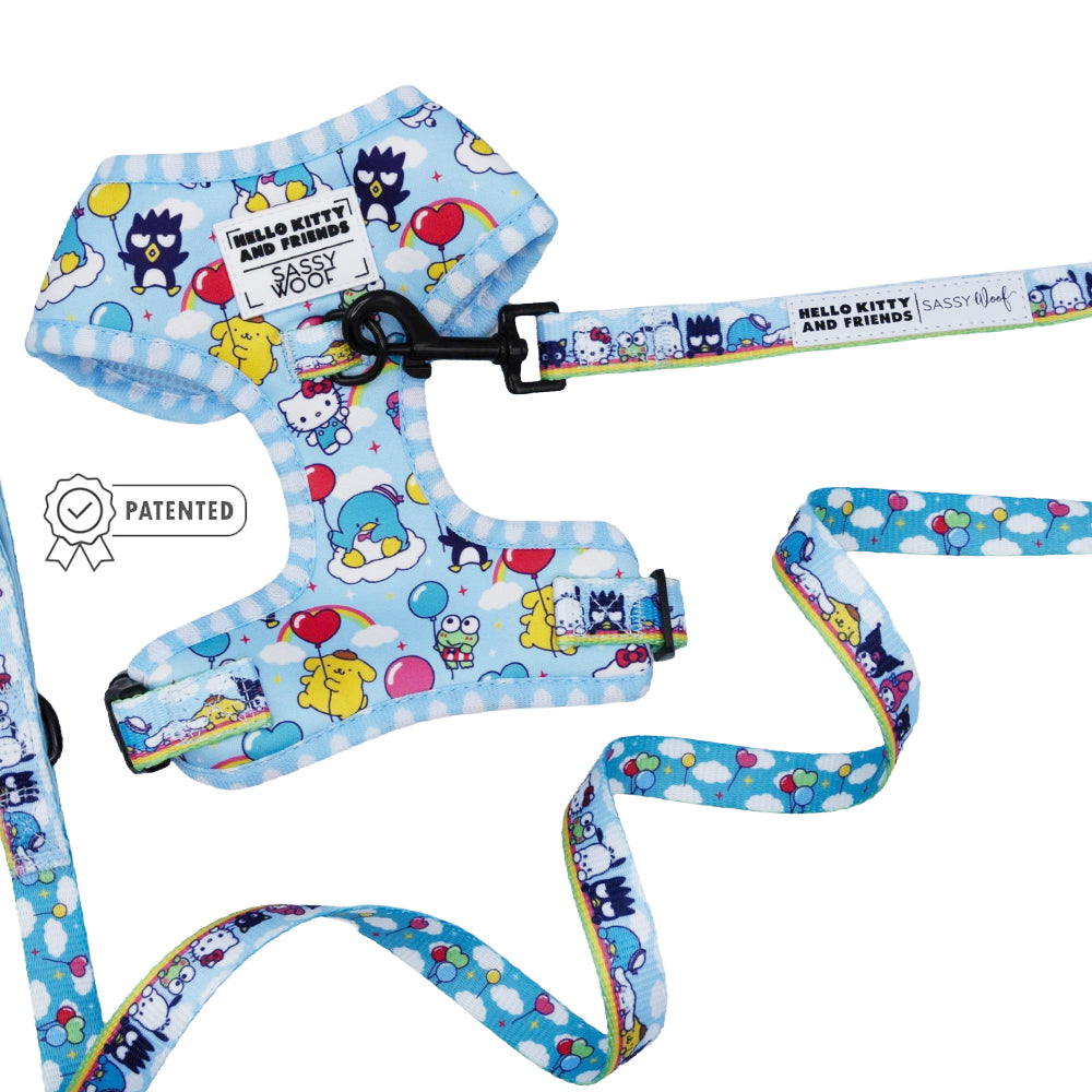 The Sassy Woof Dog Two Piece Bundle - Hello Kitty® & Friends In the Sky features a light blue harness and leash with Hello Kitty and Friends, colorful balloons, a PATENTED badge icon, and "Hello Kitty and Friends | Sassy Woof" text on the leash.