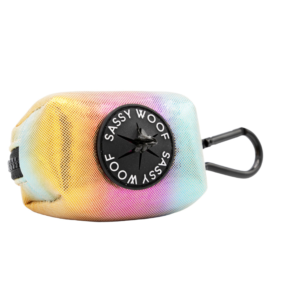 The Sassy Woof Dog Waste Bag Holder - The Night Life is a small, pastel neoprene pouch with a circular black Sassy Woof patch and black carabiner, perfect for pairing with disco dog accessories or a matching dog harness.