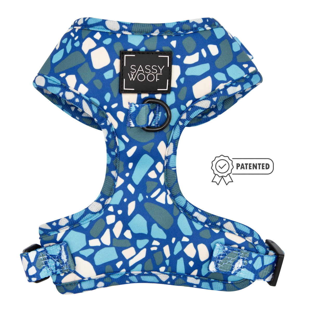 The Dog Two Piece Bundle - Santorini by Sassy Woof features a blue and white patterned harness with black label, adjustable straps, and metal leash ring. The patented Puppy Growth Pawtection Plan badge is displayed beside the bundle.