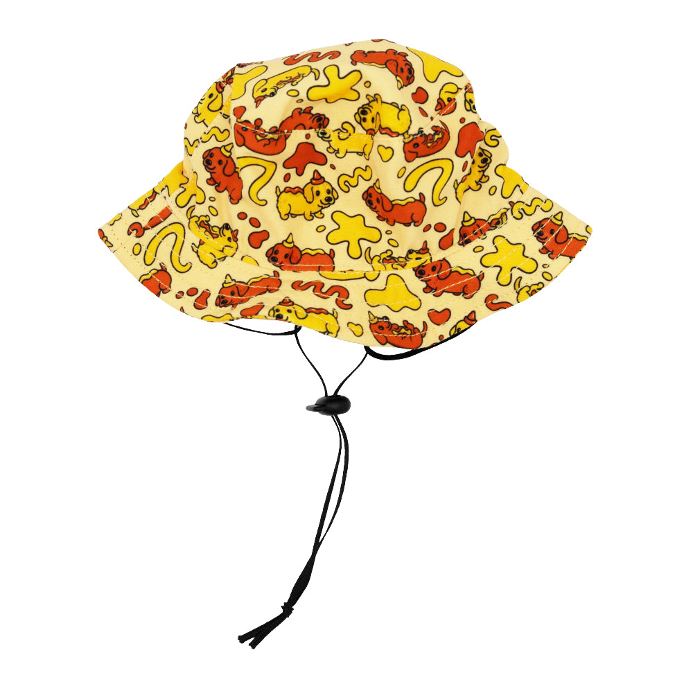 The Sassy Woof Dog Bucket Hat - Hot Dawg features a beige dachshund design with abstract red and yellow patterns, black outlines, adjustable black chin straps, and is part of our playful weenie-inspired collection.