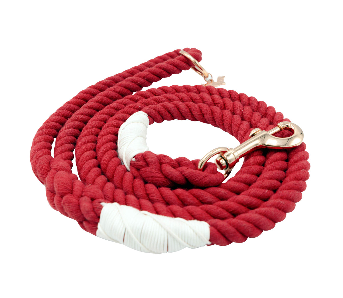 The Sassy Woof Dog Rope Leash - Crimson features a coiled red cotton rope with white detailing and a gold metal clasp, shown against a white background.