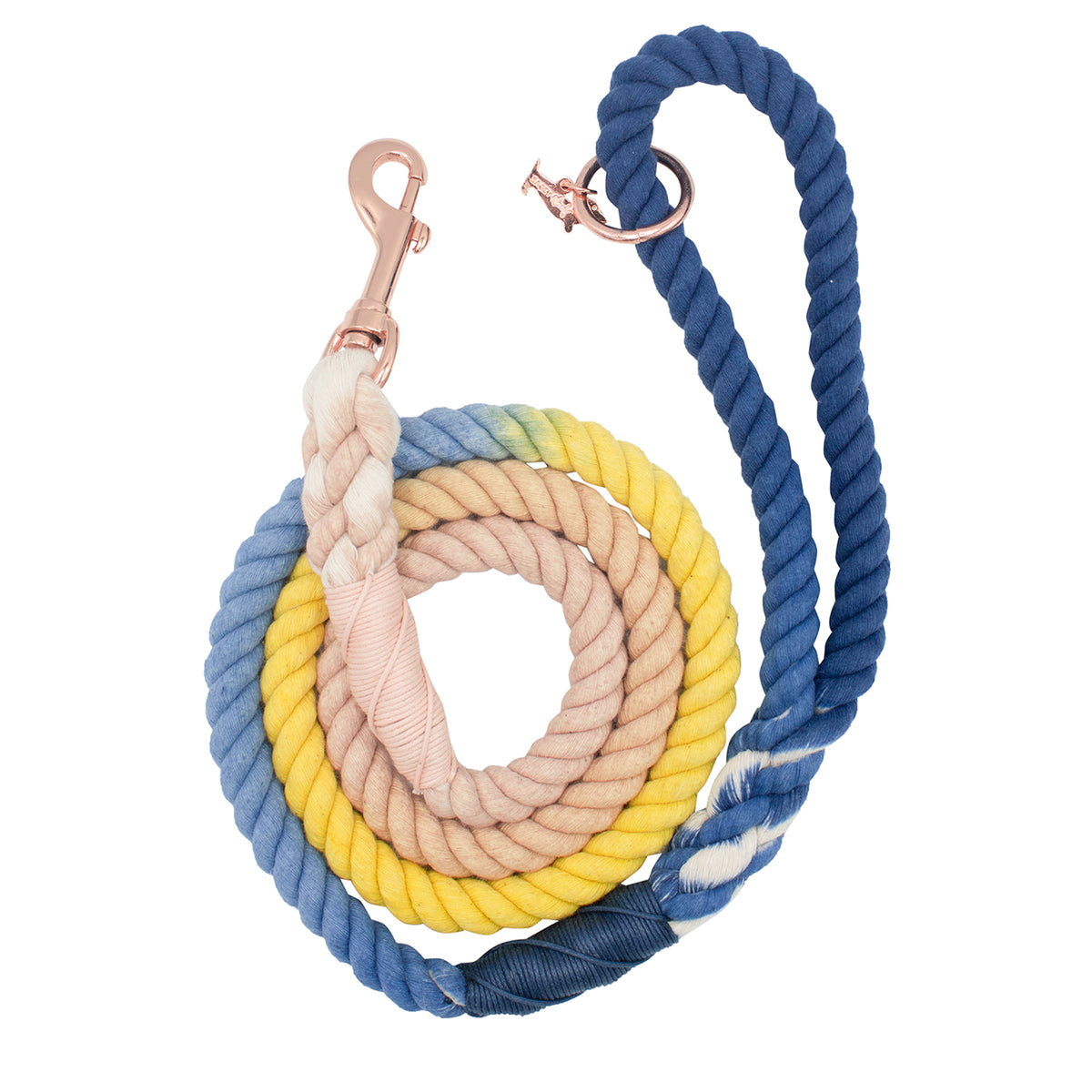 The Sassy Woof Dog Rope Leash - Airy is a hand-crafted, coiled cotton leash featuring multicolored sections in blue, pink, beige, yellow, and white, with a rose gold clasp and unique twisted rope design.