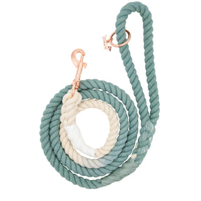 The Sassy Woof Dog Rope Leash - Dandy is hand-crafted with ombre teal green and cream rope, elegant rose gold hardware, and displayed against a white background.