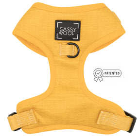 The Dog Adjustable Harness - Sunflower Fields by Sassy Woof features a patented small badge, black adjustable buckles, and a black D-ring for leash attachment. The harness displays the Sassy Woof label.
