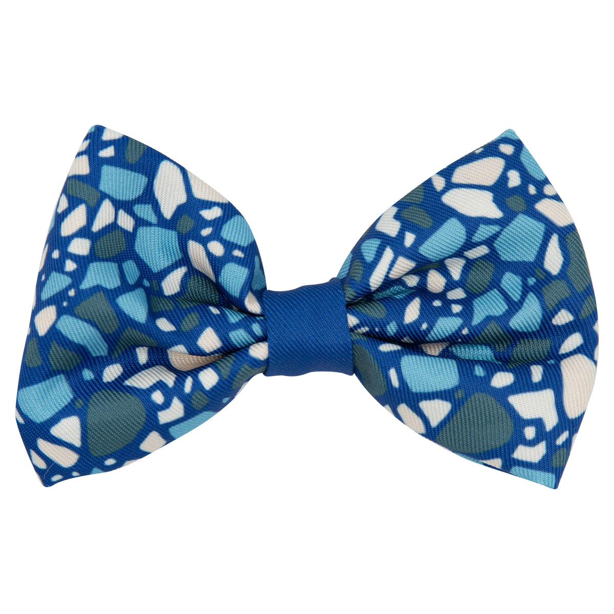 Add a pop of style to your pet’s harness or leash with the Sassy Woof Dog Bowtie - Santorini, featuring a blue mosaic pattern in white, light blue, and green, plus a solid blue center knot.