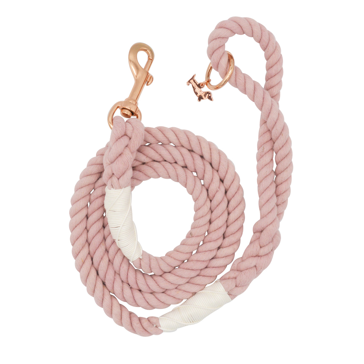 The Sassy Woof Dog Rope Leash - Rose All Day features pink cotton rope, rose gold hardware, a swivel clip, a small dog-shaped charm, and reinforced white tape wraps near the ends.