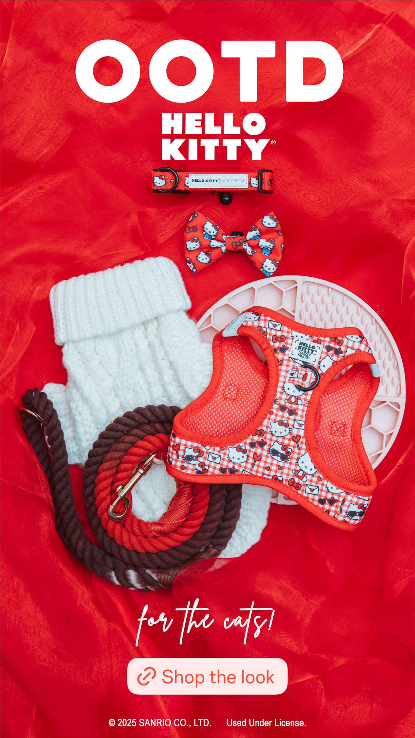 A flat lay of Hello Kitty-themed cat accessories on red fabric, including a harness, bow tie, leash, collar, and a white knit sweater. Text reads “OOTD Hello Kitty for the cats! Shop the look.”.