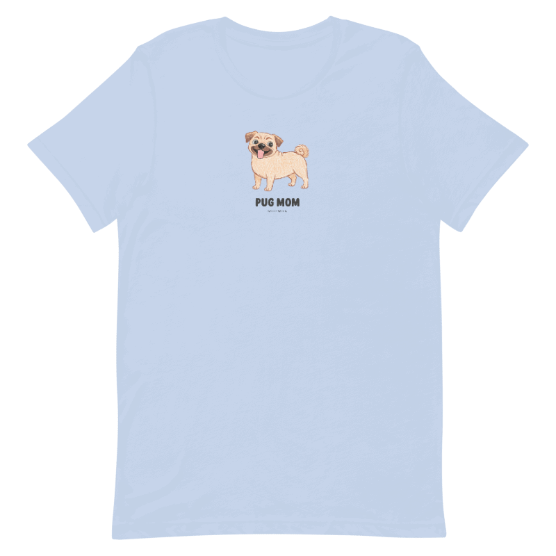 The Pug Mom Tee by Sassy Woof is a light blue unisex shirt with a cartoon smiling pug and bold "Pug Mom" text centered on the chest—perfect for proud pug lovers.