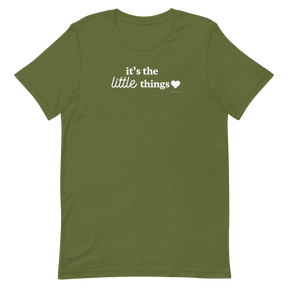 The Sassy Woof Human Tee - It's the Little Things is an olive green unisex shirt made of 100% ring-spun cotton, showcasing white "it's the little things" text with a heart on the chest, printed with eco-friendly ink.