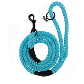 The Sassy Woof Dog Rope Leash - Neon Blue is a hand-crafted coiled cotton leash with black metal clasps and reinforced ends, shown on a white background.