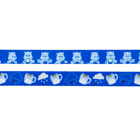 The Dog Leash - Care Bears™ Grumpy Bear by Sassy Woof features blue bears and playful cloud motifs—perfect for adding a cute, cheerful touch to your pet’s look.
