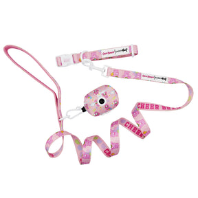 The Sassy Woof Collar Three Piece Bundle - Care Bears™ Cheer Bear includes a leash, collar, and waste bag holder with cheerful bear designs and "CHEER BEAR" lettering, plus a matching Care Bears dog harness.