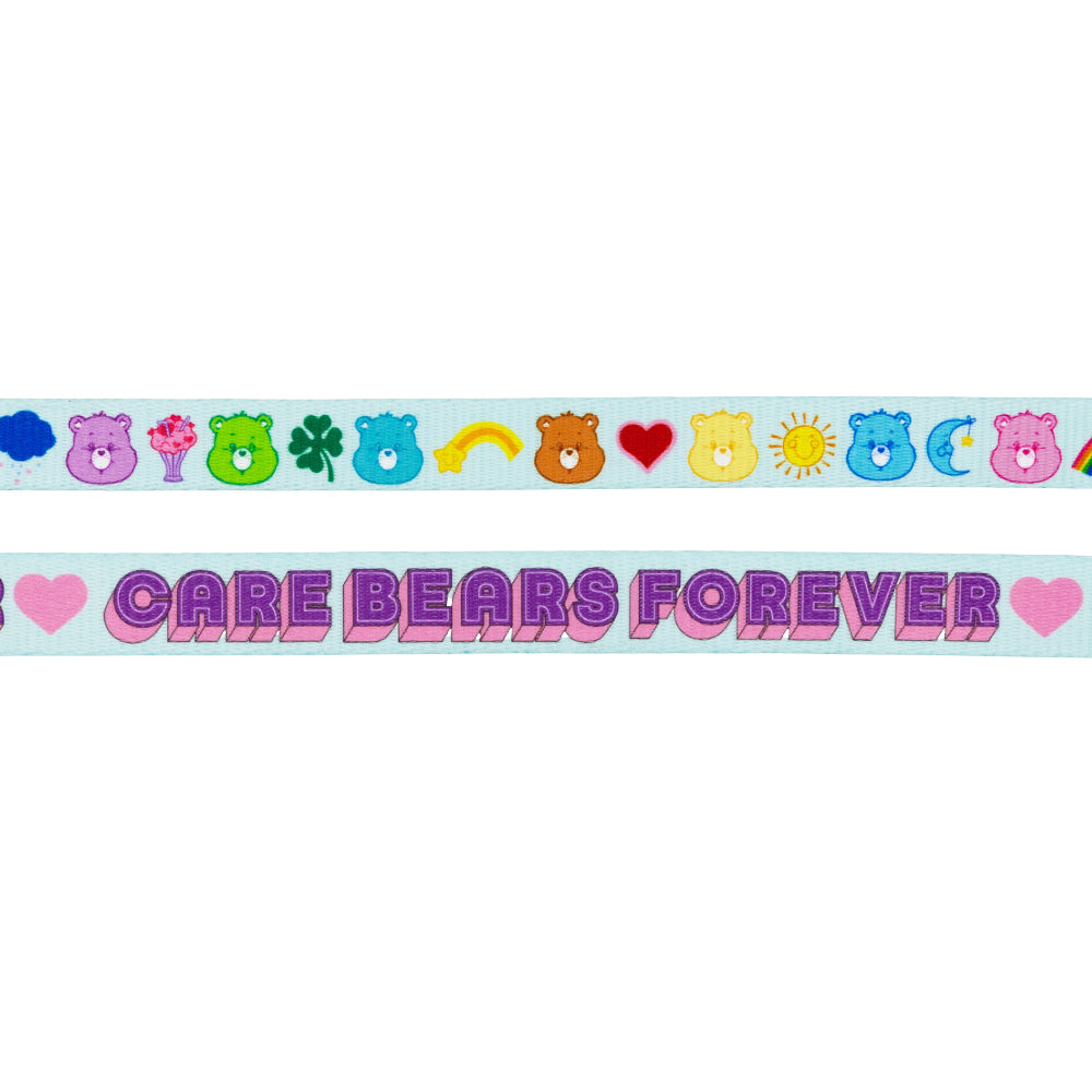 The Sassy Woof Dog Leash - Care Bears™ Care-a-Lot features two decorative strips: a top with colorful Care Bears faces and symbols, and a bottom strip reading CARE BEARS FOREVER in bold purple, both from the Care-a-Lot collection.
