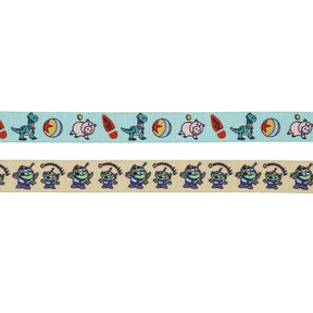 The Sassy Woof Dog Four Piece Bundle - Disney and Pixar's Toy Story features ribbon strips with dinosaurs, rocket ships, stars, a piggy bank, and green aliens with "Oooohhh!"—perfect for fans of this playful collection.