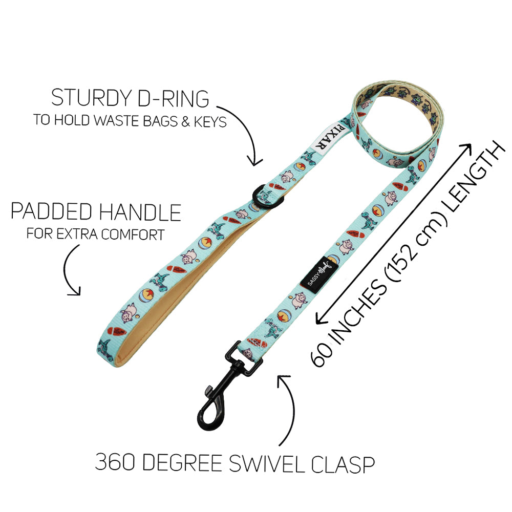 The Sassy Woof Dog Four Piece Bundle - Disney and Pixar's Toy Story includes a light blue leash with cartoon prints, sturdy D-ring, padded handle, 360° swivel clasp, and 60-inch length. Labels highlight each feature.