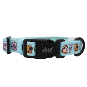 The Sassy Woof Dog Four Piece Bundle - Disney and Pixar's Up features a light blue cartoon dog collar with a logo buckle and D-ring, perfect to pair with our adjustable harness for stylish comfort as your pup grows.