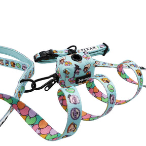 The Sassy Woof Collar Three Piece Bundle - Disney and Pixar's Up features a light blue dog harness, leash, and collar with colorful Pixar balloon and character designs, shown against a white background.