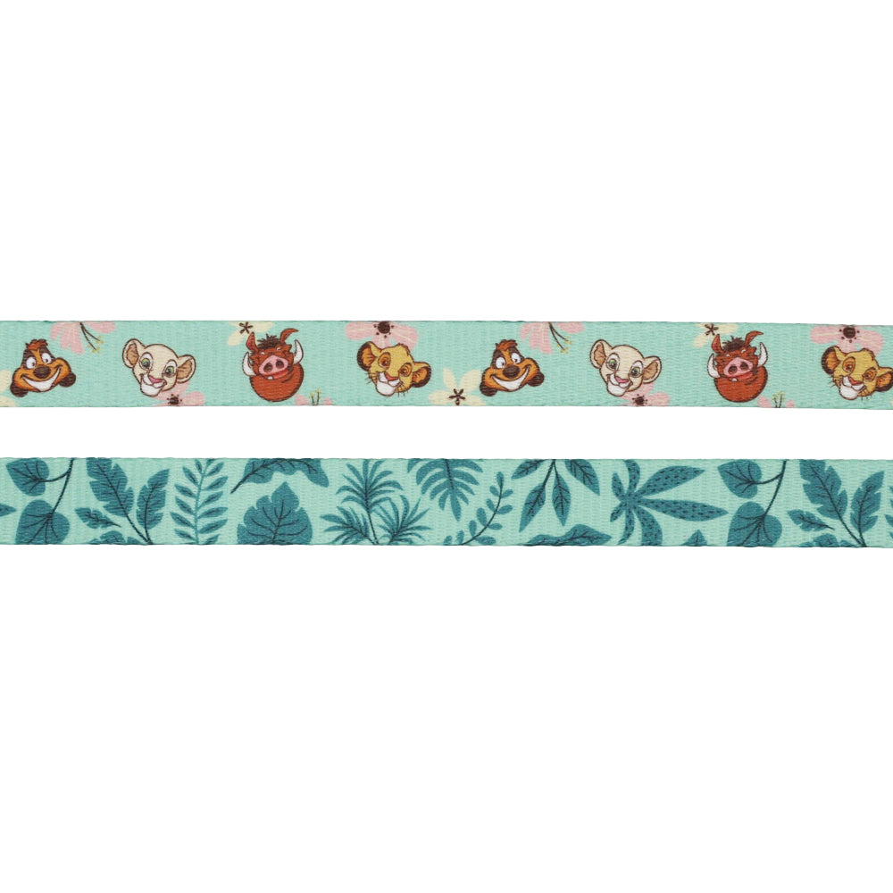 Two strips of decorative tape: the top strip features cartoon animals and flowers inspired by Sassy Woof’s Dog Leash - Disney’s The Lion King Wild Kingdom, while the bottom strip displays a blue-green leafy plant pattern.
