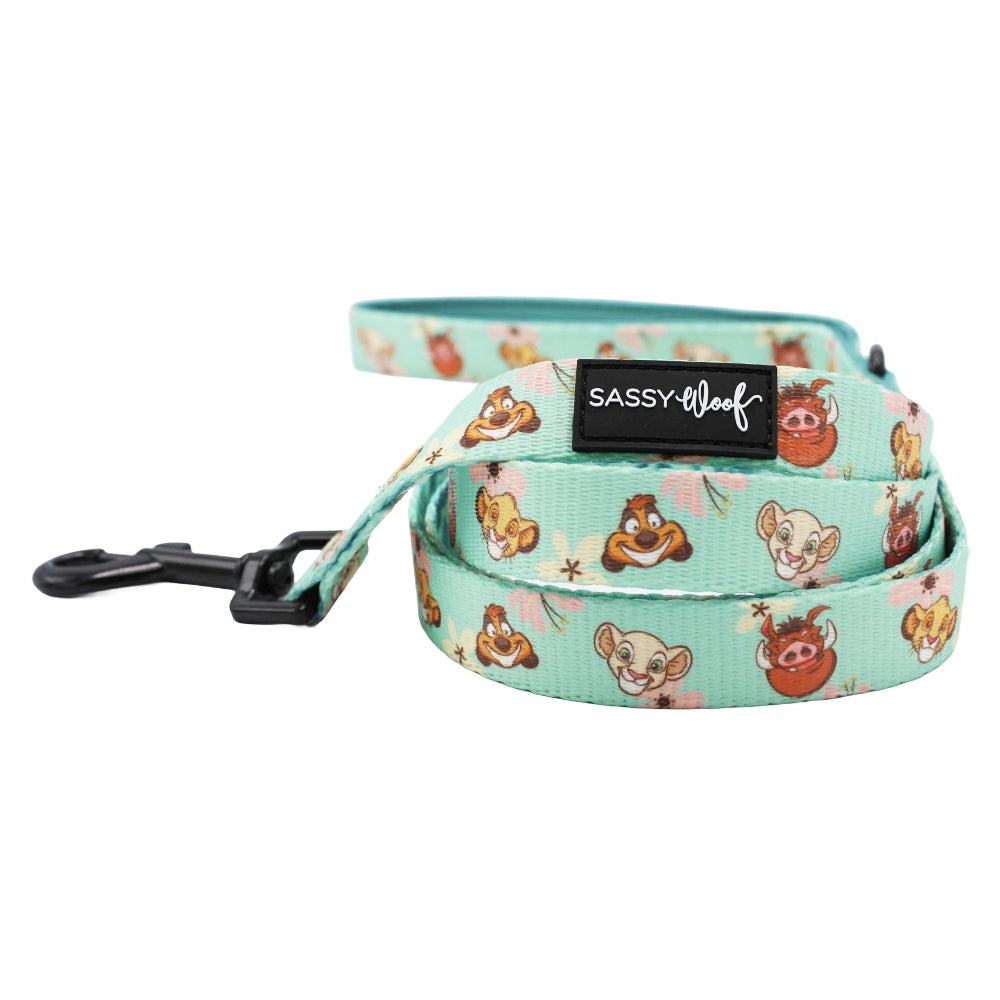 Introducing the Sassy Woof Dog Leash—Disney’s The Lion King Wild Kingdom edition. This turquoise leash features charming cartoon animal faces, a sturdy black metal clasp, and is finished with a signature Sassy Woof label. Rolled up for convenience, it pairs perfectly with your Disney dog harness or jungle dog harness for added style and fun.
