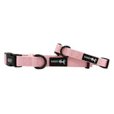 The Sassy Woof Dog Collar - Dusty Rose features an adjustable fit, comfy neoprene lining, black plastic buckle, sturdy metal rings, and a sleek black Sassy Woof label on the side.