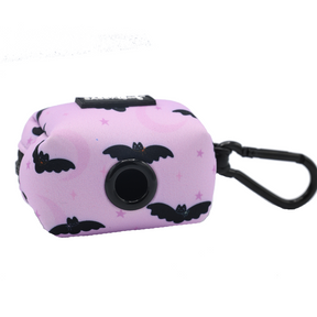 A small, rectangular, light purple pouch with black bat patterns, a circular opening in the center, and a convenient black clip for carrying—perfect for pairing with your Dog Four Piece Bundle - Lil Batty or other matching accessories from Sassy Woof.