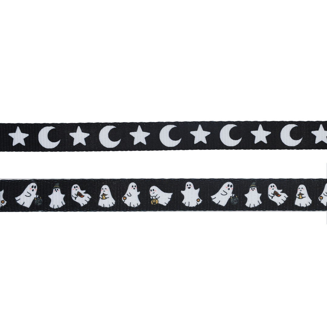 Two black ribbons: the top ribbon features a pattern of white stars and crescent moons, while the bottom ribbon showcases a repeating design of small white cartoon ghosts—perfect accents for your Sassy Woof Dog Four Piece Bundle - Lil Boo Thing or as complementary additions to any Halloween dog harness or adjustable dog collar.