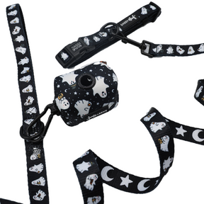 Introducing the Dog Three Piece Bundle - Lil Boo Thing from Sassy Woof! Part of the Lil Boo Thing Collection, this black dog leash set is adorned with whimsical white ghost, star, and moon patterns. It also includes a matching waste bag holder decorated with playful ghosts and stars—all displayed on a crisp white background. Perfect for Halloween walks, pair this perfectly coordinated set with your favorite Halloween dog collar for extra charm!.