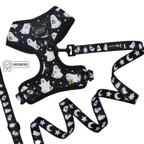 Add a touch of spooky style to your pup’s walks with the Dog Two Piece Bundle - Lil Boo Thing from Sassy Woof! This playful Halloween-themed set includes a black adjustable dog harness and matching leash adorned with white ghost, star, and moon patterns. Featuring Sassy Woof branding and a Patented badge icon, this harness and leash bundle is part of the Lil Boo Thing Dog Collection—perfect for fans of festive dog accessories!.