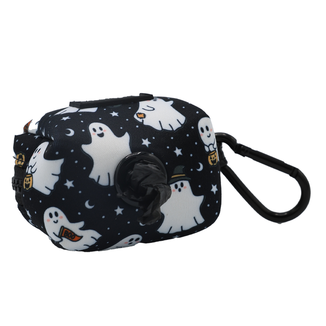 Add a spooky-cute touch to your walks with the Sassy Woof Dog Waste Bag Holder - Lil Boo Thing, featuring black fabric adorned with white cartoon ghosts, stars, and moons. Perfect for matching with your ghost-themed dog harness or trick-or-treat collar, this Halloween essential includes a convenient plastic clip for hands-free carrying and comes pre-filled with a roll of black waste bags—making it the ideal accessory for any festive outing.