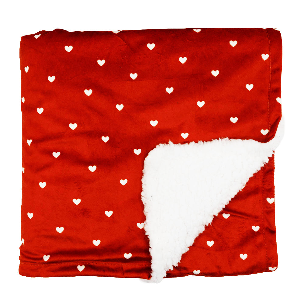 The Sassy Woof Pet Blanket - Little Love features red velvet fabric with small white hearts and a white sherpa lining, making it a perfect addition to your Valentine’s collection.