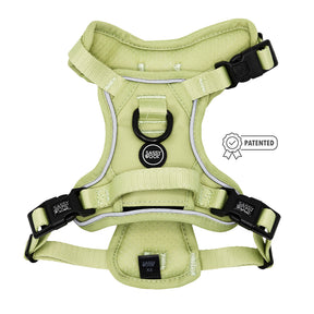 The Sassy Woof Dog Step-in Harness - Matcha is light green with adjustable reflective straps, black buckles, a black metal D-ring, Air Tag pocket, Sassy Woof logo on the front, and a Patented badge icon beside it.