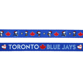 The Sassy Woof Dog Two Piece Bundle - MLB™ x Peanuts™ Toronto Blue Jays™ features Snoopy in a baseball uniform, team text, hearts, and maple leaves—ideal for crafting a unique baseball dog leash or matching harness.