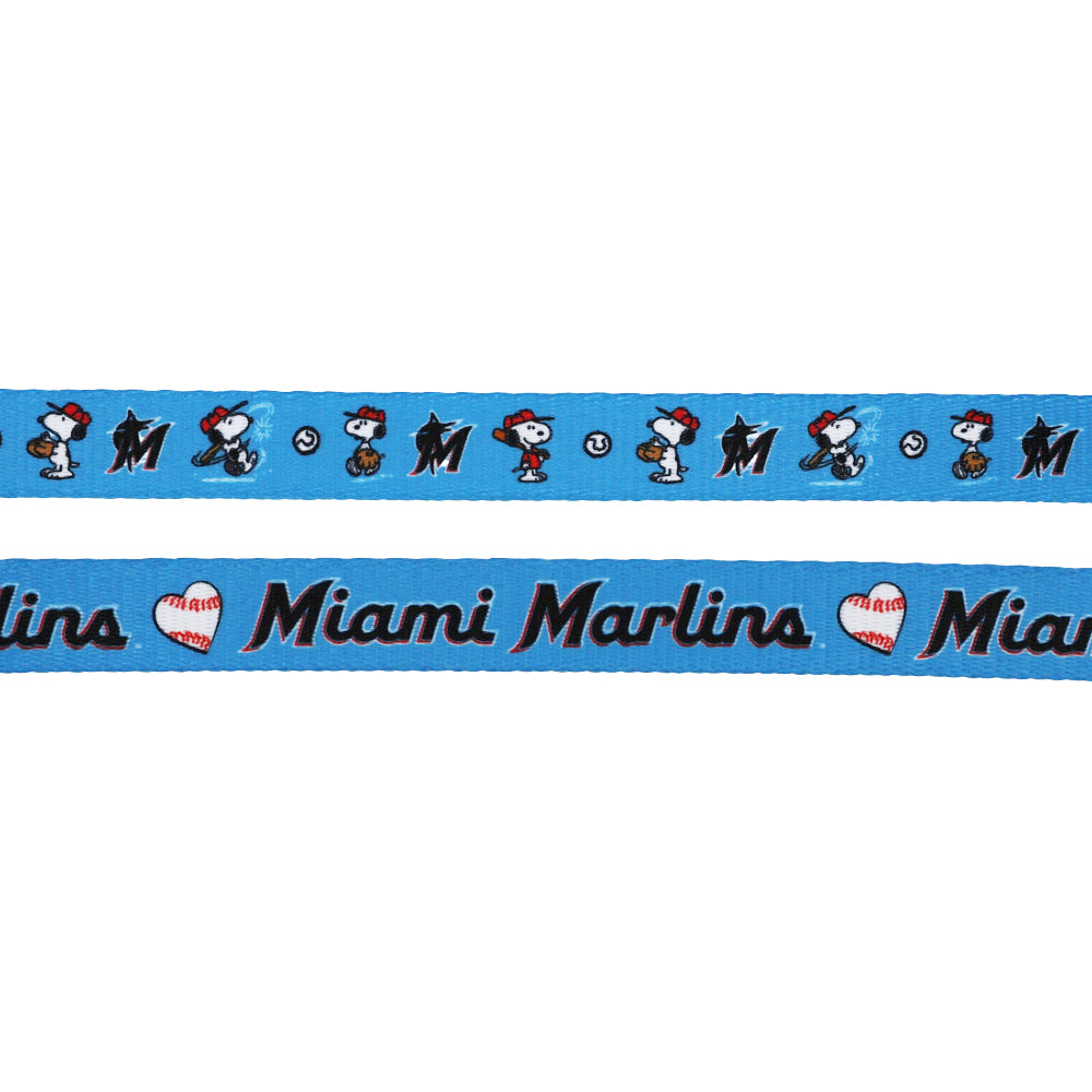Show your pup’s team spirit with the Dog Two Piece Bundle - MLB™ x Peanuts™ Miami Marlins™ from Sassy Woof, featuring Snoopy in a baseball uniform and Miami Marlins logos—perfect for fans or as a playful baseball-themed pet accessory.