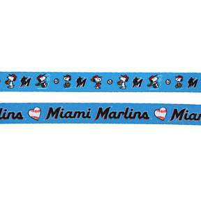 Show your pup’s team spirit with the Dog Two Piece Bundle - MLB™ x Peanuts™ Miami Marlins™ from Sassy Woof, featuring Snoopy in a baseball uniform and Miami Marlins logos—perfect for fans or as a playful baseball-themed pet accessory.