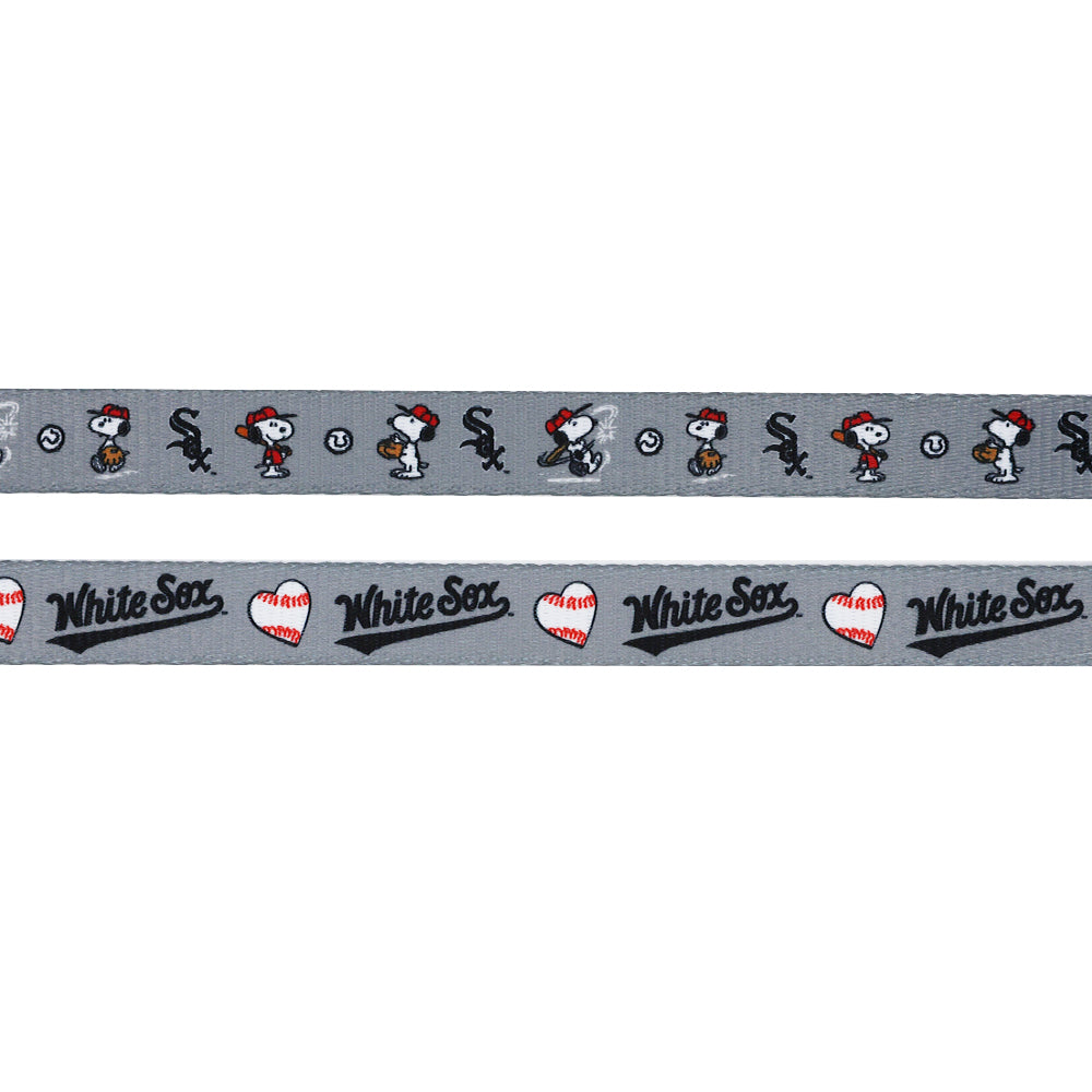 The Sassy Woof Harness Three Piece Bundle - MLB™ x Peanuts™ Chicago White Sox™ features gray ribbon with Snoopy in a baseball uniform, the team logo, baseballs, and sporty graphics—perfect for fans and their pups.