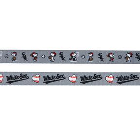The Sassy Woof Harness Three Piece Bundle - MLB™ x Peanuts™ Chicago White Sox™ features gray ribbon with Snoopy in a baseball uniform, the team logo, baseballs, and sporty graphics—perfect for fans and their pups.