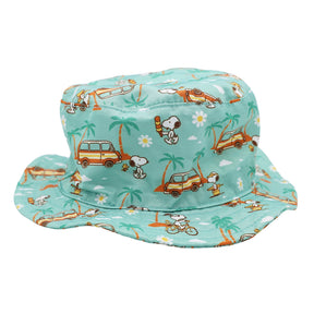 The Sassy Woof Dog Bucket Hat - Peanuts™ Road Trippin' features light blue fabric with cartoon Snoopy, palm trees, surfboards, vans, and clouds in orange, green, and white—ideal for dogs who love fun Snoopy accessories.