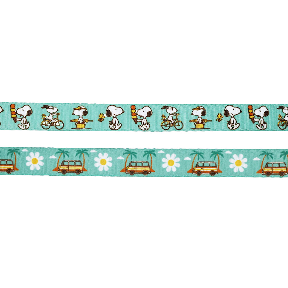 The Sassy Woof Dog Two Piece Bundle - Peanuts™ Road Trippin' includes two decorative ribbons: one with Snoopy biking and skateboarding, and one with orange vans, palm trees, and white flowers on teal.