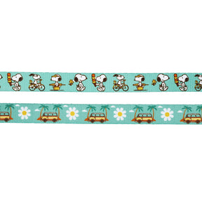 The Sassy Woof Collar Three Piece Bundle - Peanuts™ Road Trippin' features Snoopy biking and skateboarding, plus yellow vans, daisies, and palm trees—perfect for adventure dog gear.