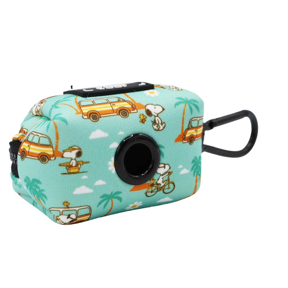 The Sassy Woof Dog Waste Bag Holder - Peanuts™ Road Trippin' features Snoopy and Woodstock in tropical scenes with cars and palm trees. This teal neoprene holder includes a black clip—perfect dog gear for adventures.