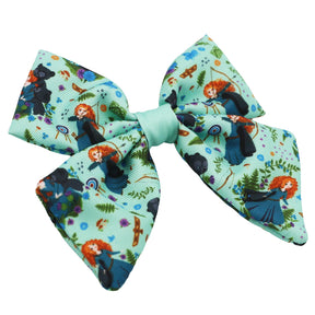The Sassy Woof Dog Sailor Bow - Disney's Merida features a light blue design with Merida, archery targets, bears, and forest elements—perfect for fans of Brave or anyone seeking Merida-inspired dog accessories.