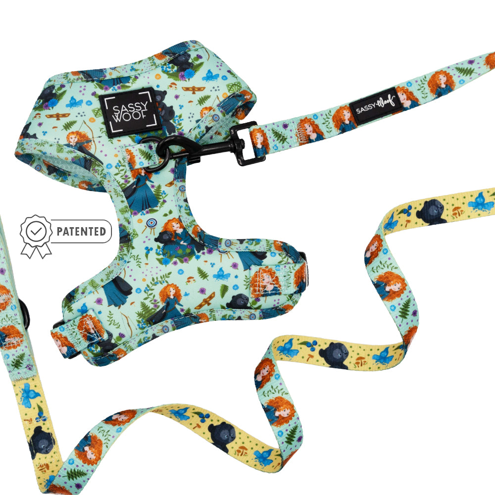 The Sassy Woof Dog Two Piece Bundle - Disney's Merida features a light blue harness and leash with fun princess and bear designs, plus a Sassy Woof label—perfect for Brave fans seeking Merida-inspired dog accessories.