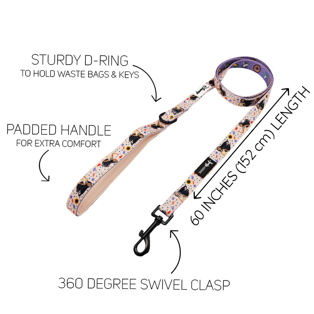 The Sassy Woof Dog Two Piece Bundle - Disney's Pocahontas features a cartoon dog print leash with padded handle, sturdy D-ring for keys or waste bags, 360° swivel clasp, and a 60-inch (152 cm) length—perfect for Disney fans and their pups.