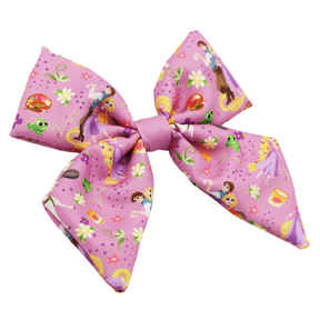 The Sassy Woof Dog Sailor Bow – Disney's Rapunzel features a large, neatly tied knot and vibrant Rapunzel-themed designs, making it a perfect match for your dog's Disney accessories.