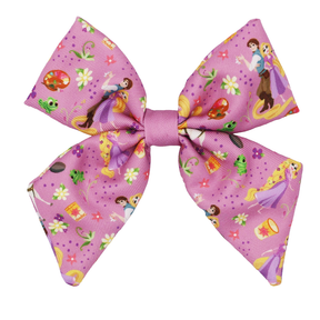 The Dog Sailor Bow - Disney's Rapunzel by Sassy Woof is a large pink bow with cartoon Rapunzel, lanterns, flowers, and a chameleon, perfect for matching your Tangled-inspired Disney dog accessories.