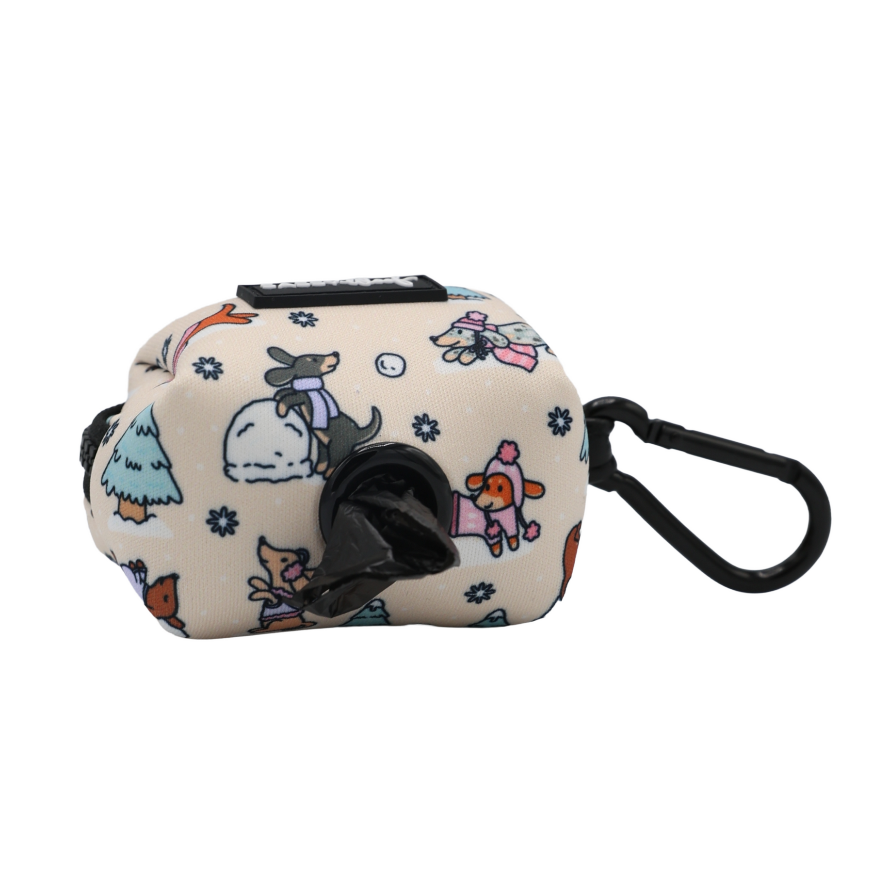 Add playful style to your walks with the Sassy Woof Dog Waste Bag Holder - Weenie Wonderland. This beige pouch features a black clip and a front dispenser hole, adorned with cartoon dogs—including adorable dachshunds in cozy winter accessories—plus snowflakes and trees. Part of the Weenie Wonderland Collection, it’s a charming way to carry waste bags on your outings.